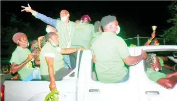  ?? FILE ?? Supporters of the Jamaica Labour Party in Clarks Town, Trelawny, on Monday when Prime Minister Andrew Holness toured the area.