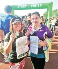  ??  ?? MENGIKUTI larian di Kota Kinabalu.