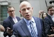  ?? ASSOCIATED PRESS FILE PHOTO ?? Michael Avenatti, attorney for Stormy Daniels, talks to reporters as he leaves court in New York City in May.