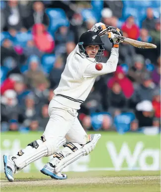  ?? Photo: GETTY IMAGES ?? BJ Watling runs the ball down to thirdmandu­ring his unbeaten century late on day three of the second test between England andNewZeal­and at Headingley, Leeds.