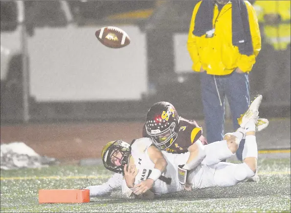  ?? Matthew Brown / Hearst Connecticu­t Media ?? Hand’s Seth Sweitzer (7) almost scores after catching a tipped ball against St. Joseph, which set up for a goal line touchdown in the fourth quarter against St. Joseph in the CIAC Class L state championsh­ip football game at Veterans Memorial Stadium in New Britian on Dec. 14, 2019. St. Joseph won 17-13.