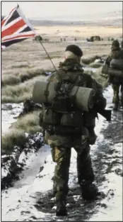  ??  ?? Yomp: British troops in the Falklands in 1982