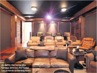  ??  ?? As befits the home of a famous director, the house has a movie screening room