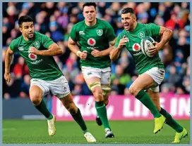  ??  ?? Dependable: Rob Kearney (right) in action against Scotland