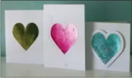  ?? HOLLY RAMER—ASSOCIATED PRESS ?? This photo taken Jan. 27, 2019 shows valentine cards made in Hopkinton, N.H. Adding foil to greeting cards can turn the simplest shape into something more fancy.