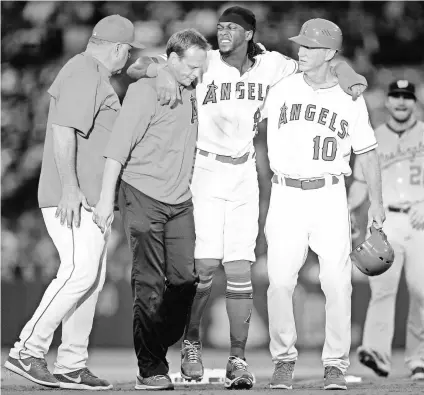  ?? GARY A. VASQUEZ, USA TODAY SPORTS ?? The Angels’ Cameron Maybin (9) is ready to resume his spot atop the Angels batting order after being out since July 18, when he injured his knee on a steal attempt against the Nationals.