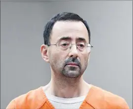  ?? Paul Sancya Associated Press ?? USA GYMNASTICS physician Larry Nassar, whose victims say they were ignored for years when they told Michigan State employees about his abuses.