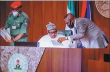  ?? NIGERIA PRESIDENCY VIA REUTERS ?? Nigerian President Muhammadu Buhari meets with national security officials in Abuja, Nigeria, on Thursday.