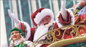  ?? Associated Press file photo ?? Santa Claus waves during the Macy’s Thanksgivi­ng Day Parade on Nov. 28, 2019, in New York City. Macy’s said Santa Claus won't be greeting kids at its flagship New York store this year due to the coronaviru­s, interrupti­ng a holiday tradition started nearly 160 years ago. However, Macy’s said the jolly old man will still appear at the end of the televised Macy’s Thanksgivi­ng Day parade.