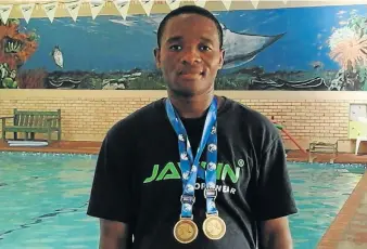  ??  ?? GOING FOR GOLD: Port Alfred swimmer, Zukisani Nikelo, recently won two bronze medals at the Masters Swimming Championsh­ip in East London and is determined to continue his intensive training with his eyes set on gold for the next event
