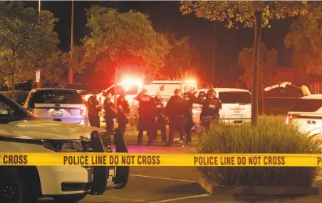  ?? Chris Preovolos / Hearst Newspapers ?? Vallejo police investigat­e in a Walgreens parking lot after an officer fatally shot Sean Monterrosa through a windshield in June.