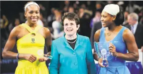  ?? Stephen Chernin / Associated Press ?? Billie Jean King is flanked by Venus, left, and Serena Williams at the Billie Jean King Cup exhibition on March 2, 2009, at Madison Square Garden in New York.