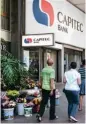  ?? /Sunday Times ?? Business pause: Capitec Bank has temporaril­y closed 300 branches in unrest hotspots.