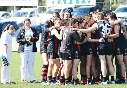  ??  ?? Maffra players huddle together before the start of Sunday’s semi-final to reinforce their game plan to take on Moe. The plan worked to perfection with the Eagles jumping to a quick start and never being threatened in a convincing win that took them...