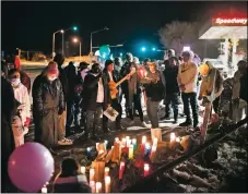  ?? MORGAN TIMMS/Taos News ?? Friends and family held a vigil Friday (Dec. 18) to honor Deluvino ‘Tuti’ Casías, who was killed by a motorist on Dec. 16 while riding his bike near the southside Speedway gas station in Ranchos de Taos.