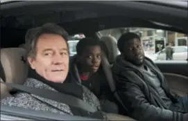  ?? DAVID LEE — STXFILMS VIA AP ?? This image released by STXfilms shows Bryan Cranston, from left, Jahi Di’Allo Winston, and Kevin Hart in a scene from “The Upside.”