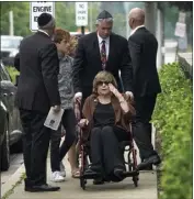  ?? PHOTOS BY CHARLES REX ARBOGAST — THE ASSOCIATED PRESS ?? Linda Straus, widow of Stephen Straus who was killed in a mass shooting at the Fourth of July parade in Highland Park, Ill., arrives for a funeral service with family members at the Jewish Reconstruc­tionist Congregati­on Friday.