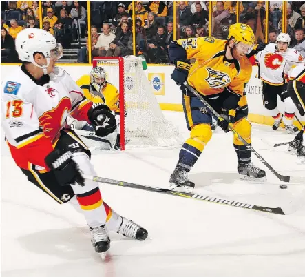  ?? FREDERICK BREEDON/GETTY IMAGES ?? A former 30-goal scorer, Johnny Gaudreau has plummeted from sixth in league scoring a year ago to 81st this season (11 goals and 28 assists in 50 games). The Flames winger has not been the difference-maker he was before he signed his current US$40.5-million deal.