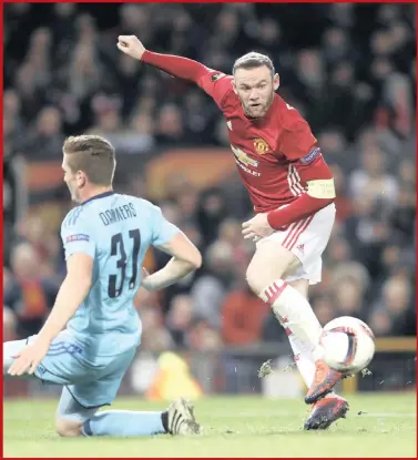  ??  ?? Wayne Rooney passes to Juan Mata to score their second goal against Feyenoord.