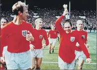  ??  ?? CHAMPIONS: England and Ray Wilson celebrate after winning the 1966 World Cup at Wembley, after beating West Germany 4-2.