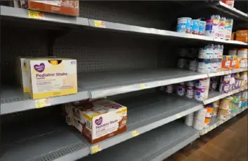  ?? Scott Olson/Getty Images ?? Baby formula has been is short supply in many stores around the country for several months.