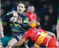  ??  ?? Outstandin­g: Cobus Reinach on the attack for Saints