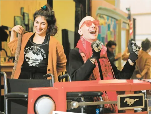  ?? K.C. ALFRED U-T ?? Farah Dinga and Jeremy Wilson rehearse a scene from the La Jolla Playhouse POP tour show “Emily Driver’s Great Race Through Time and Space.”