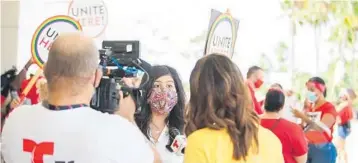  ?? GERALD LEONG/ORLANDO SENTINEL ?? State Rep. Anna Eskamani, R-Orlando, speaks with reporters in September during a protest with Local 362, a union representi­ng hospitalit­y workers, after the airport concession­aire HMSHost announced that they would terminate as many as 782 workers.