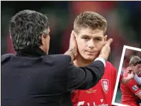  ??  ?? SPECIAL FEELING: Mourinho consoles and tussles with Gerrard, who has p praised Jose