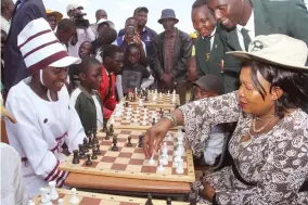  ?? Innocent Makawa — Picture: ?? First Lady Auxillia Mnangagwa plays a game of chess with Chipundira High School student Dorcas Dube during First Lady’s Family Fun Day at Chipadze Stadium in Bindura yesterday.