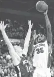  ?? JAMES SNOOK, USA TODAY SPORTS ?? Center Sam Dower, right, dominated in Gonzaga’s season- opening win.