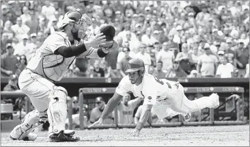  ?? CHRIS LEE / ST. LOUIS POST-DISPATCH VIA ASSOCIATED PRESS ?? Cardinals rookie Tommy Pham, called up Friday from the Redbirds, scores the winning run on a sacrifice fly by Jhonny Peralta as San Diego Padres catcher Derek Norris waits for the throw in the eighth inning Saturday in St. Louis. The Cardinals won 2-1.