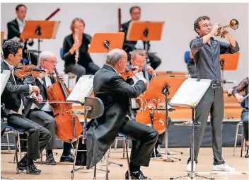  ?? FOTOS: MARIE LAFORGE ?? Trompeter Simon Höfele (rechts) ist Duisburgs neuer „Artist in Residence“.