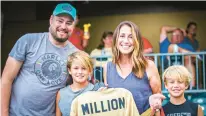  ?? CJ WITHERSPOO­N/LEHIGH VALLEY IRONPIGS ?? Sara Lloyd was honored Friday as the IronPigs’ 8 millionth fan in the franchise’s 14th season.