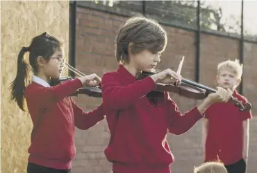  ??  ?? 0 Play On: Music aims to remove the financial barriers to learning an instrument
