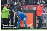  ?? ?? Struck down… Marseille’s Payet