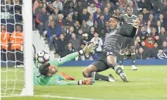  ??  ?? Chelsea’s Michy Batshuayi scores their first goal. — Reuters photo