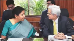  ?? PHOTO: SANJAY K SHARMA ?? Finance Minister Nirmala Sitharaman and RBI Governor Shaktikant­a Das at a meeting on Saturday. Das refused to comment on the AGR ruling and its implicatio­ns