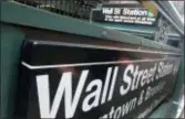  ?? RICHARD DREW — THE ASSOCIATED PRESS ?? This file photo shows the Wall Street subway stop on Broadway in New York’s Financial District. U.S. stocks sank again on Wednesday and cemented February as the worst month for the market in two years.