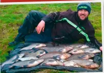  ??  ?? Left: Chris Ponsford and pals Dave Healey and Andy Mason enjoyed a great day’s sport at Llandegfed­d Reservoir in Wales. Below: Jake Elston and Carl Yeowell (pictured) took a bumper 120lb haul of bream from Rysons Lake, Islip, Northants.