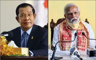  ?? HEAN RANGSEY, AFP ?? Prime Minister Hun Sen (left) and his Indian counterpar­t Narendra Modi discussed their diplomatic relationsh­ip and joint efforts in fighting Covid-19.