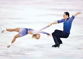  ??  ?? Top of their game: skaters Aliona Savchenko and Bruno Massot