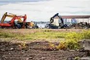  ?? Hearst Connecticu­t Media file photo ?? Debris from demolished buildings is cleared for The Haven project on Water Street in West Haven on May 10, 2021.