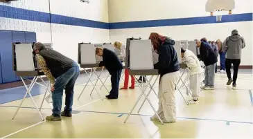  ?? Carol Kaliff/For Hearst Connecticu­t Media file photo ?? Danbury residents vote at Stadley Rough School on Election Day, Nov. 8, 2022.