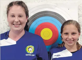  ?? SUBMITTED PHOTO ?? Abby Bunn, 14, and her sister Kasey, 11, of Ennismore, are having great success competing in archery this summer. Although Abby has been competing for years, this is the first time Kasey has competed alongside her.