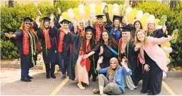  ?? STEPHAN HARVEY GROSSMONT COLLEGE ?? Grossmont College graduates in CalWorks support group for single parents got students to donate caps and gowns to help out future grads.