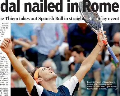  ??  ?? Dominic Thiem of Austria celebrates after beating Rafael Nadal at the Italian Open tennis tournament in Rome.