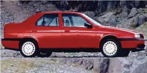  ??  ?? Side view of the Alfa Romeo 155.