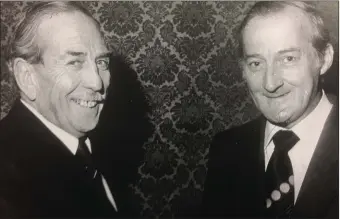  ??  ?? Mr Desmond Scaife, left, the retiring general manager of Butlin’s Mosney, congratula­ting the new general manager Mr Tony McCullen, at a reception in the Shelbourne Hotel, Dublin, in 1974.