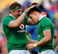  ??  ?? POWER: Jamie Heaslip (main) of Ireland rides tackles from Italy’s Sergio Parisse and Maxime Mbanda in Rome while the visitors’ Cian Healy (above) is held back by Parisse and Lorenzo Cittandi as Heaslip (left) congratula­tes Garry Ringrose on scoring his...